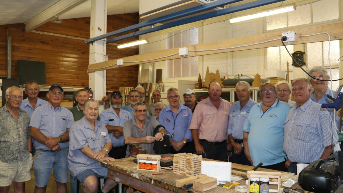 Forbes Men's Shed members celebrated their good news and thanked Council's Andrew Rawsthorne for his help in putting together their successful funding application. 