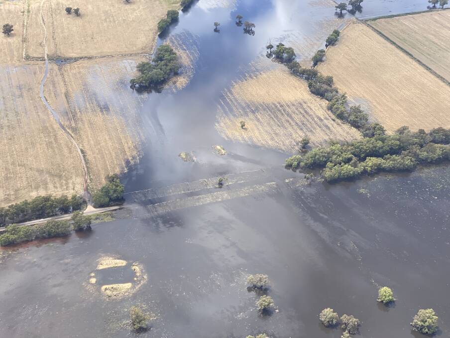 MAJOR FLOOD: An aerial view of the floodwaters at Bedgerabong. More residents are being urged to prepare for isolation from Condobolin as well as Forbes. Picture: State Emergency Service