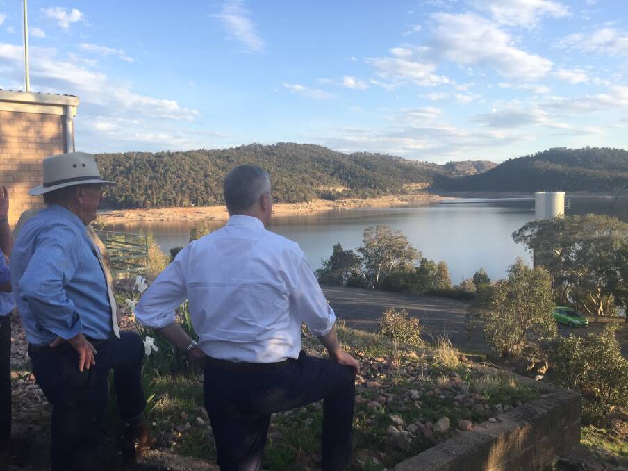 Member for Riverina and Deputy Prime Minister Michael McCormack looks over Wyangala Dam with Cowra mayor Bill West.