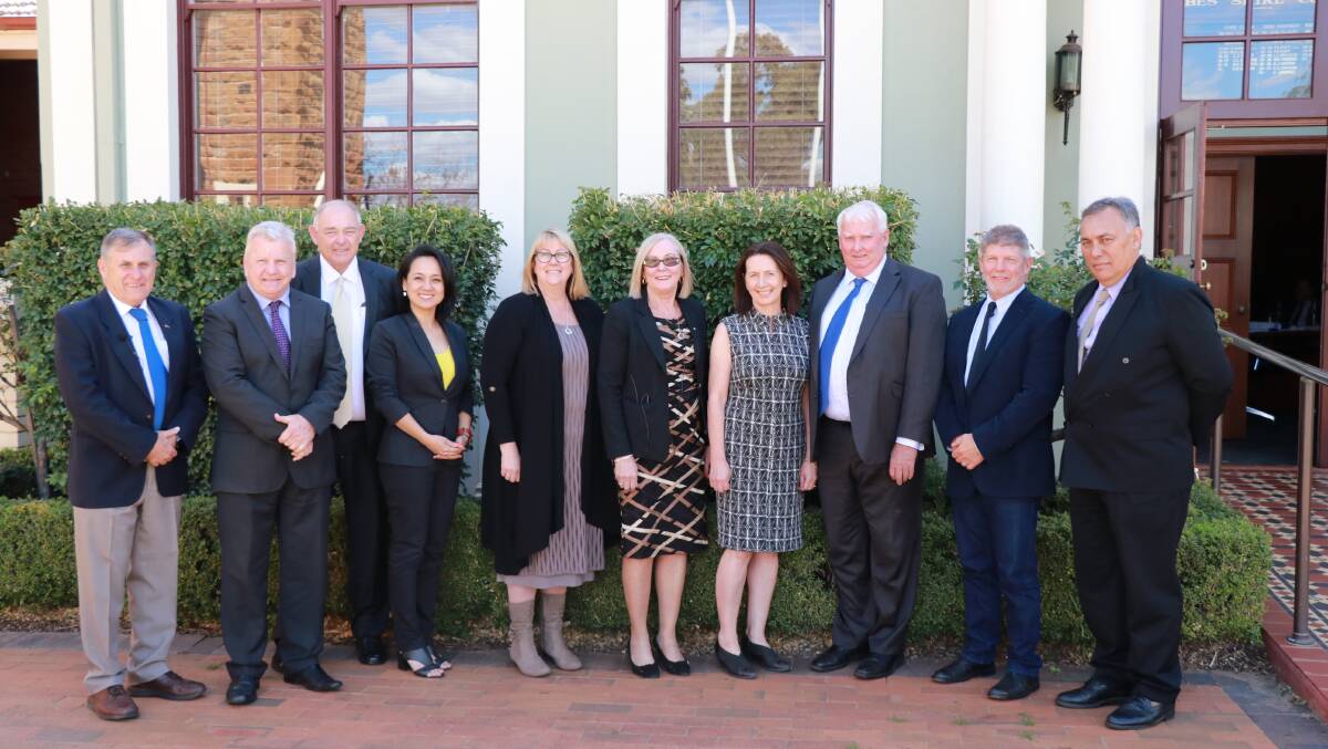 FORBES SHIRE COUNCIL ELECTED 2016: Councillors Chris Roylance, Grant Clifton, Susan Chau, Michele Herbert, Phyllis Miller, Jenny Webb, Graeme Miller, Jeff Nicholson and Steve Karatiana with General Manager Steve Loane pre-COVID-19. Picture: File