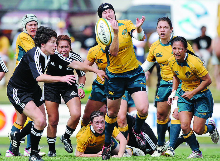 Alana Thomas playing rugby for Australia. 
