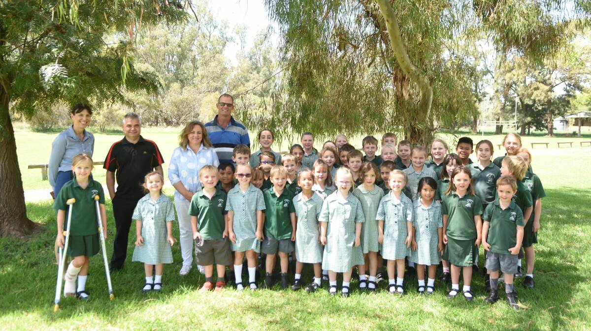 Bedgerabong Public School students with Chris and Maryanne Harrison from McDonalds Forbes, Prue Hain and Murray Brown from Bedgerabong P and C, and Robert's big sisters Georgia and Ella (on left).