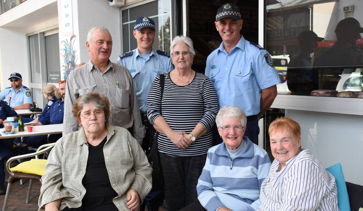 (Sitting) Dianne Decker, Yvonne Glasson and Wilma Hepburn, (Standing) Neil Hawke, Daniel Greef, Lyn Ward and Adrian Mathews at Forbes Coffee with a Cop in 2018.
