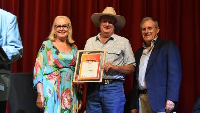 Mayor Phyllis Miller OAM and Deputy Mayor Chris Roylance congratulate Citizen of the Year Laurie Norris.