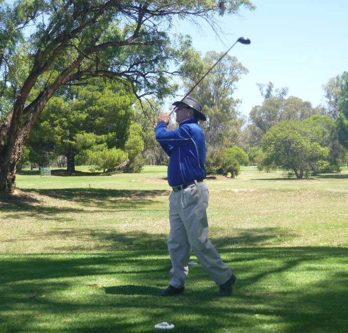 Barry Parker leans as he tries to steer his tee shot. Photo supplied.