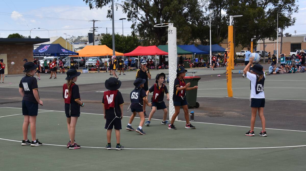 Cracking on Court: Action on the local netball courts during a school gala day Forbes hosted. Help is needed in the canteen each week, and this week the rostered team is Koalas from Division 3.
