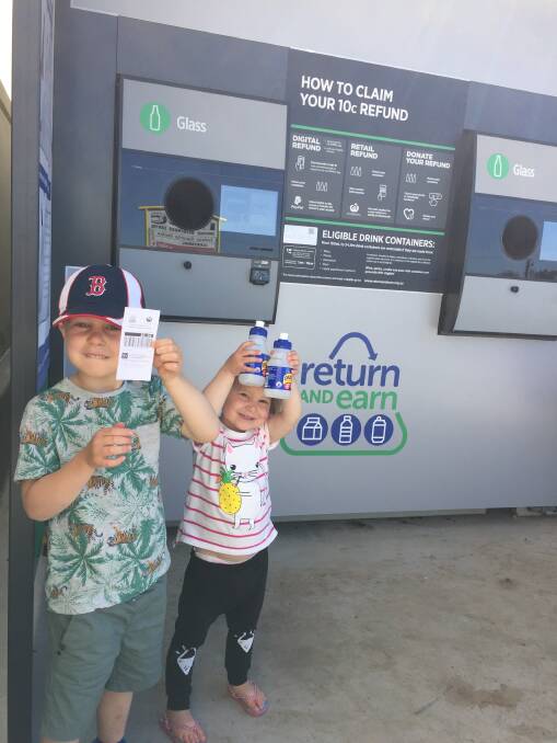 Edith and Reuben Toohey were two of the eager customers to use the Forbes reverse vending machine when it was installed in early October. Photo supplied. 