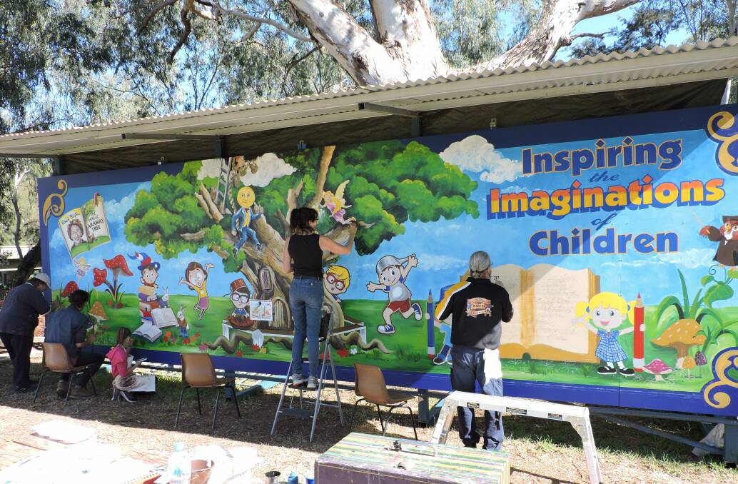Emma, Matthew, Macey, Shaz and BJ working on the incredible 'Faraway Tree' mural, now at Eugowra Public School, in 2019.