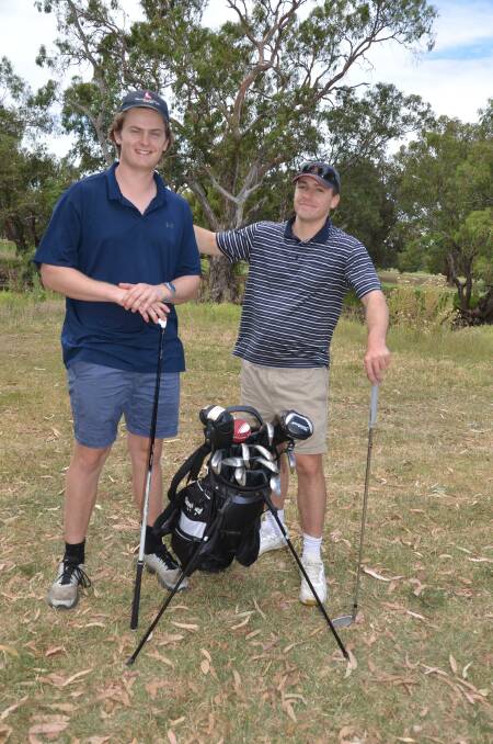 Sam Ridley and Alex Scott enjoying a game on the Forbes golf course. 