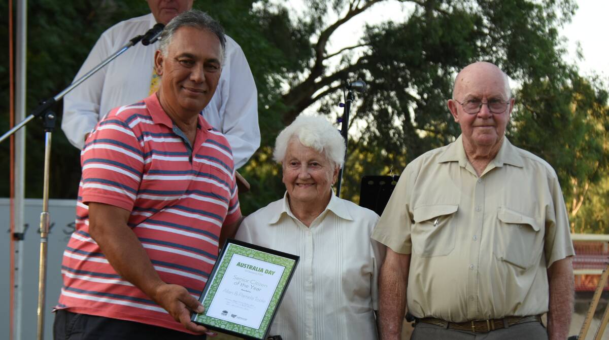Cr Steve Karaitiana presents Pamela and Allan Toole with the first Forbes Senior Citizen of the Year honour. 