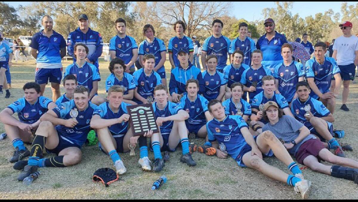 The 16s celebrating their Lachlan junior rugby league celebration.