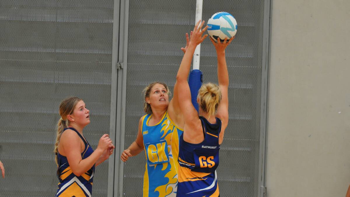 Nicole Mee in defence in Sunday's regional carnival. Photo Central Western Daily.