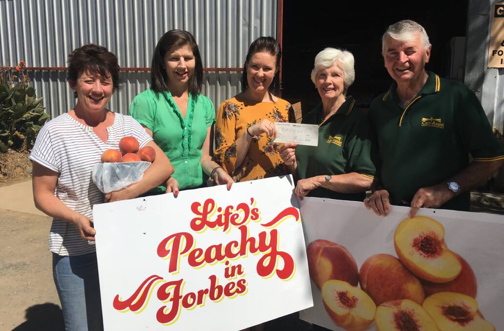 Karen Betland from Betlands Orchards, Forbes Shire Council Economic Development Officer, Sally Duff, Forbes Shire Visitor Services Officer, Jade McGovern, Can Assist President, Murray Field, and treasurer, Maureen Field.