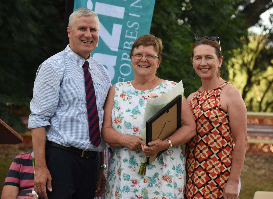 Member for Riverina Michael McCormack and Council's Australia Day Committee chair Cr Jenny Webb congratulate Citizen of the Year Sue-anne Nixon. 