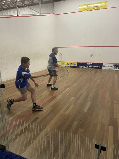 SUMMER SQUASH: Max Ridley in Blue and Neil Toole during a rally. Picture: SUPPLIED