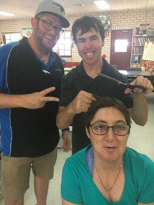 Currajong Support Worker Doug Pout with Blake Huntly and Fiona McGonigal. 