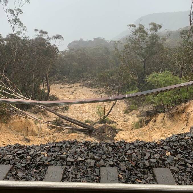 Part of Blue Mountains rail line closed by landslip, motorists warned about Bells Line