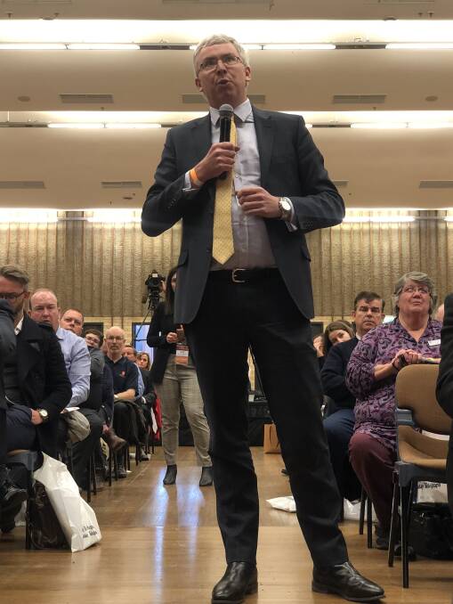QUESTIONING THE PM: "How we do we persuade more people in the city that there is something beyond the Blue Mountains," Angus Edwards from the Bathurst Business Chamber asked the Prime Minister. Photo: BELINDA SOOLE