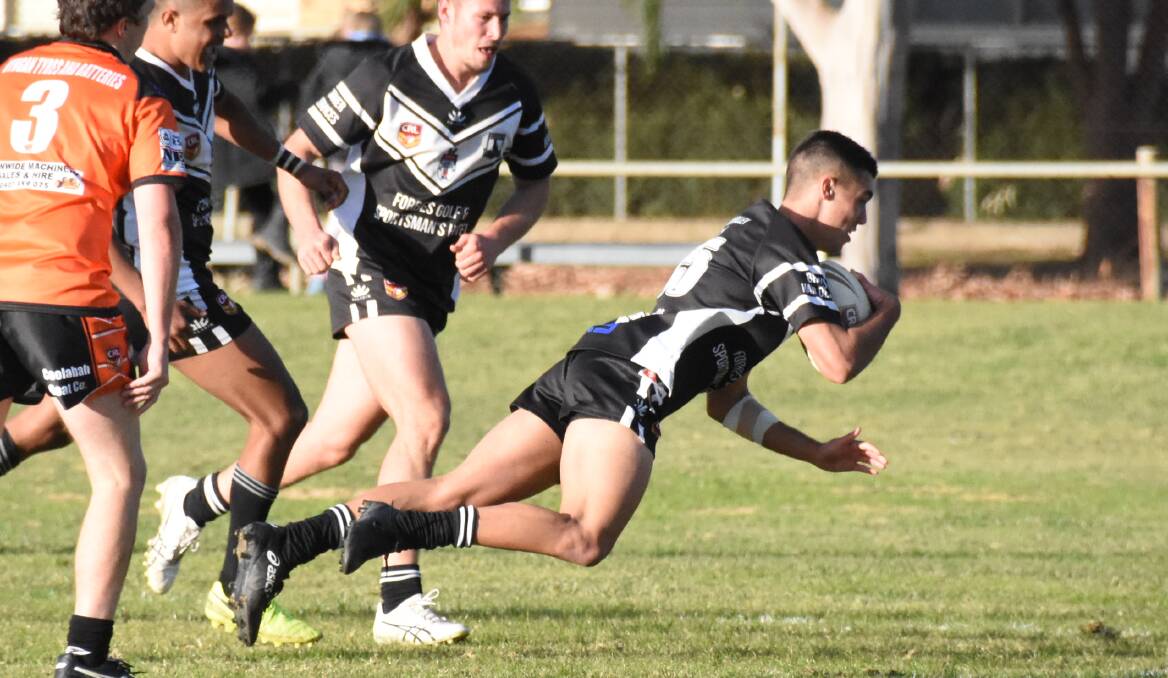 TRY TIME: Charlie Staines dives over for a try in Forbes' win over Nyngan. 