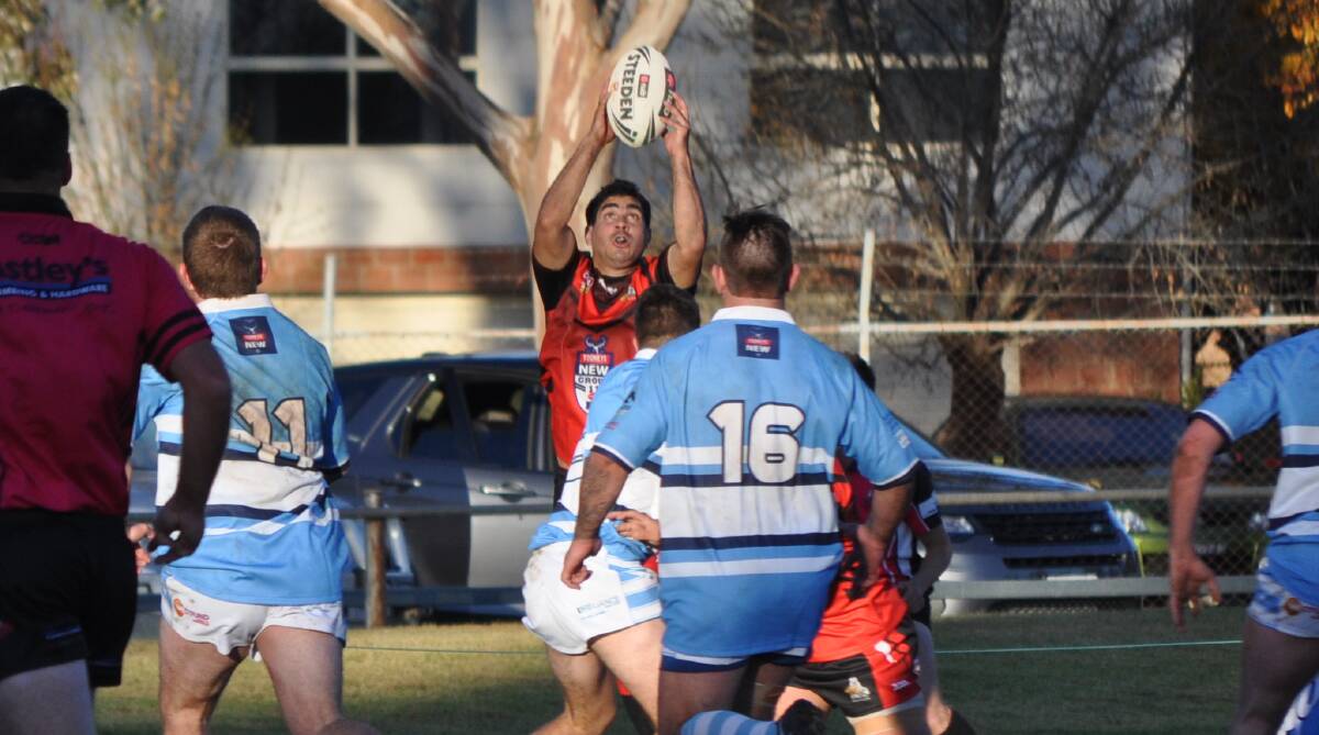 GOT IT: Sam Coe catches a Bailey Hartwig flick pass before crossing for his side's third try. Photo: NICK McGRATH