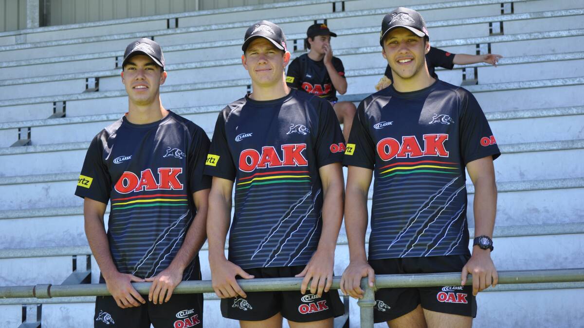 PANTHERS: Charlie Staines, Matt Burton, Joey Hobby in their Penrith Panthers gear. Photo: NICK McGRATH