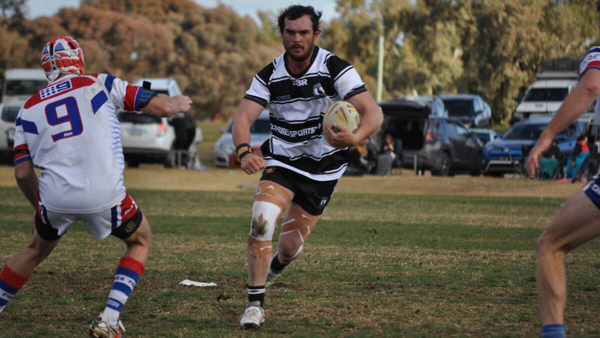 ON THE CHARGE: Forbes prop Ben Maguire spots a gap in the Parkes defensive line during his side's final round thrashing of the Spacemen at Spooner Oval, he's hoping for more success this Saturday in week one of the Group 11 finals when the Magpies host the Macquarie Raiders. Photo: NICK McGRATH