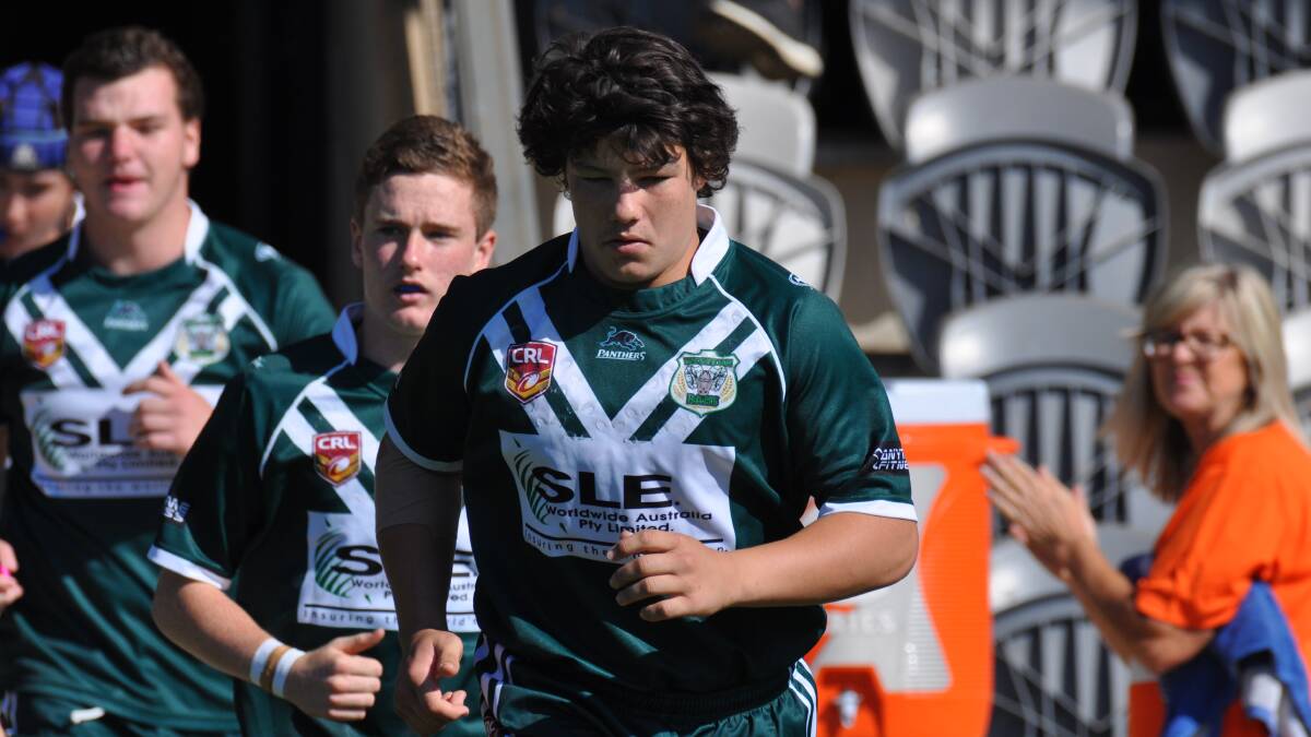 LEADING THE CHARGE: Jack Hartwig leads Western out during its semi-final of the Andrew Johns Cup earlier this year. Photo: NICK McGRATH