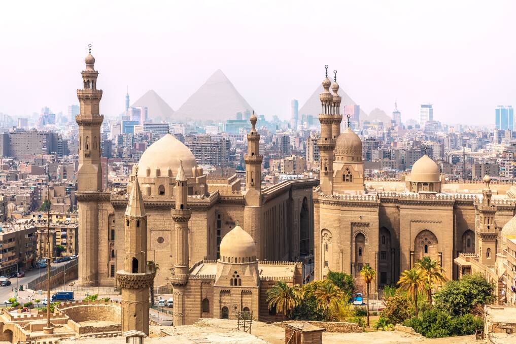 Mosque-Madrassa and Pyramids, Cairo. Picture Shutterstock