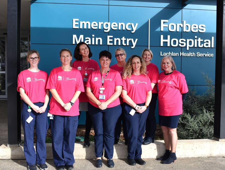 Gina Anderson, Bailee Harrison, Jenny Webb, Janelle Toole, Trish Milford, Linda Tory, Nadine Moxey and Phyllis Miller encourage Forbes women to book in for a visit to the BreastScreen van.