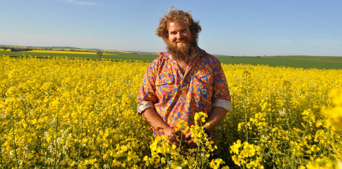 Simon Moloney with his ATR Gem canola crop planted on April 24. Australia's canola production is expected to rise by 47 per cent this year. 