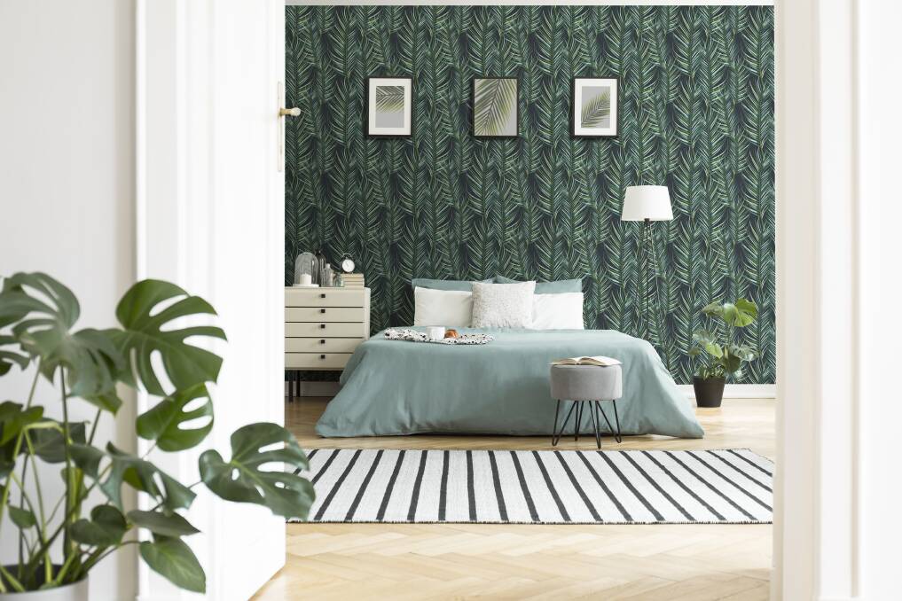 The biophilia trend continues, bridging the gap between indoor and outdoor living. Pictured is Superfresco Easys Elegant Green Palm Leaves Wallpaper. 