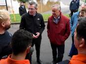 NSW Premier Dominic Perrottet and Prime Minister Anthony Albanese meet with SES volunteers in Richmond. Picture: AAP
