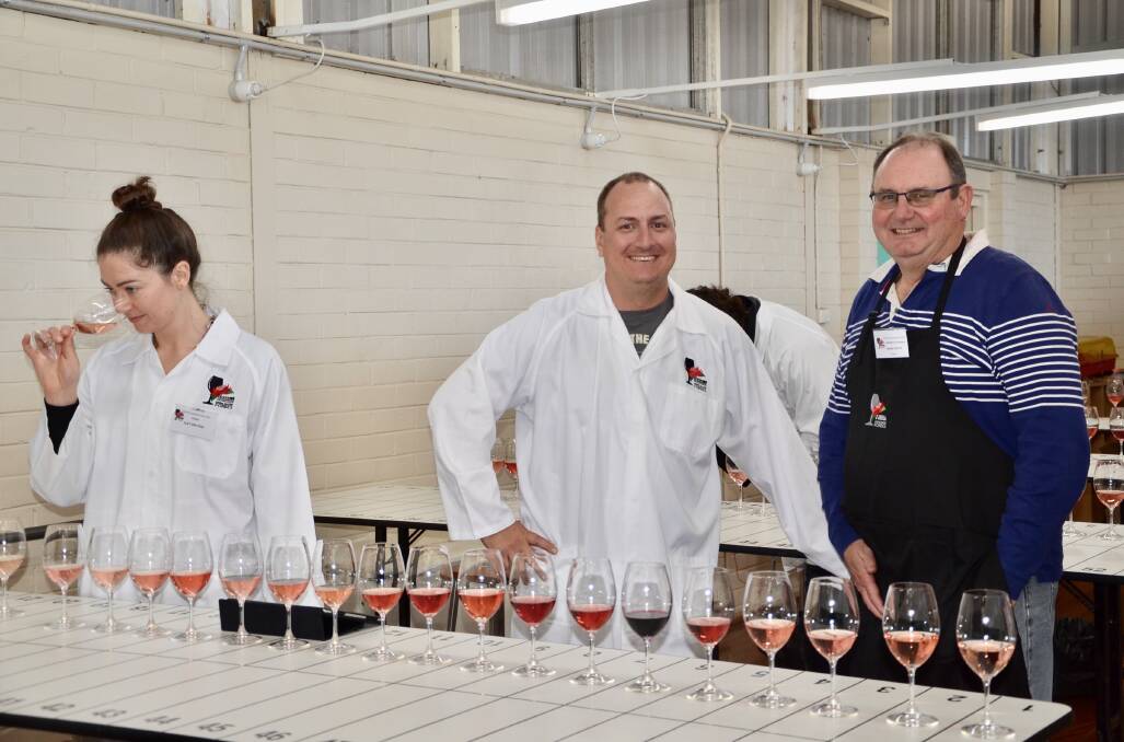 STOP AND SMELL THE ROSÉ: Judge Lucy Bruton, Chairman of Judges Mike De Iuliis and NSW Small Winemakers Wine Show President Mark Watts. 