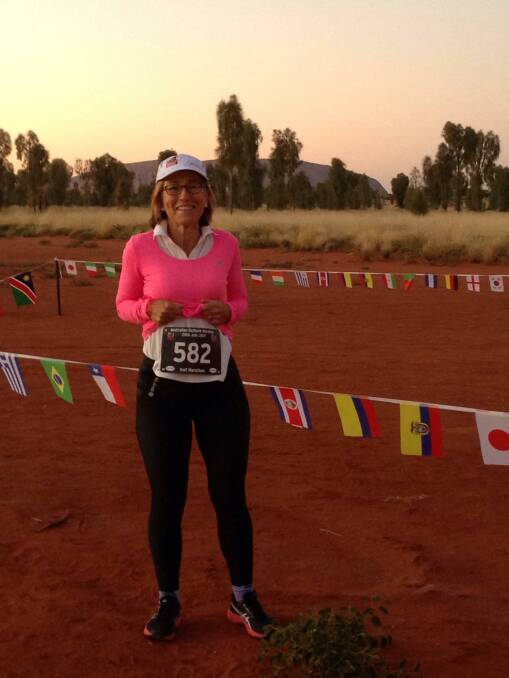 RUNNING ON RED EARTH: Janet Norton-Knight completed her first half-marathon on Saturday, a 21.1km run in Uluru/Kata Tjuta National Park.