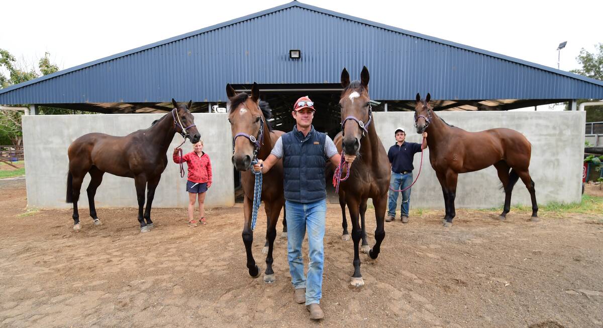 AWESOME FOURSOME: Clint Lundholm with Sarah Trebley (left), Jake Parsons (right) and his four Country Championships contenders. Photo: BELINDA SOOLE