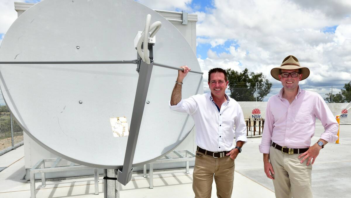 BETTER WEATHER OBSERVATIONS ON THE WAY: Paul Toole and Adam Marshall visit the site of a new doppler radar at Yeoval, north of Parkes. Photo: SUPPLIED.