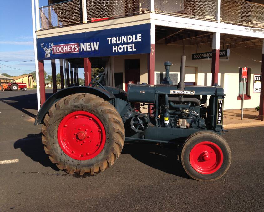 STEEPED IN HISTORY: Is there anything more iconic than a photo of a beautifully restored McCormick-Deering tractor in front of the historic Trundle Hotel? Photo: Digger Anderson.
