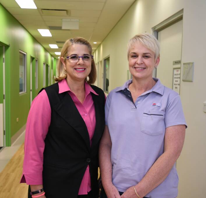 SUPPORTING WOMEN: McGrath breast care nurse Sue Kuter with cancer survivor and Monday's breast reconstruction awareness event speaker Cathy Clark. Photo: JUDE KEOGH: 0314jkbreast1