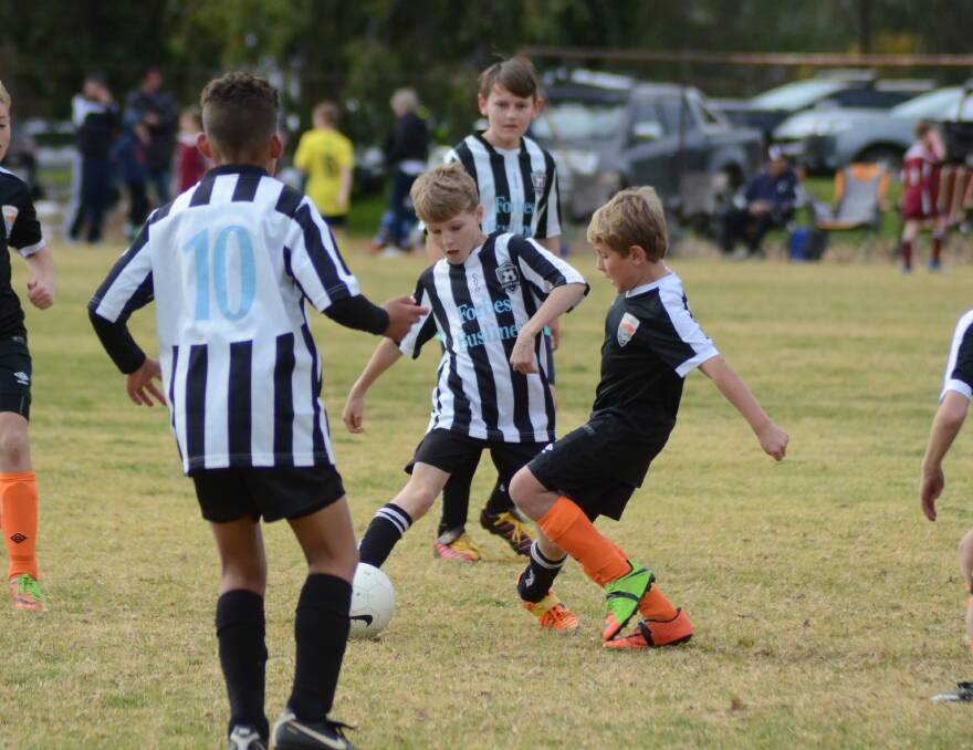 Angus Webb tackles for Forbes during the 2017 soccer gala day. File photo. 