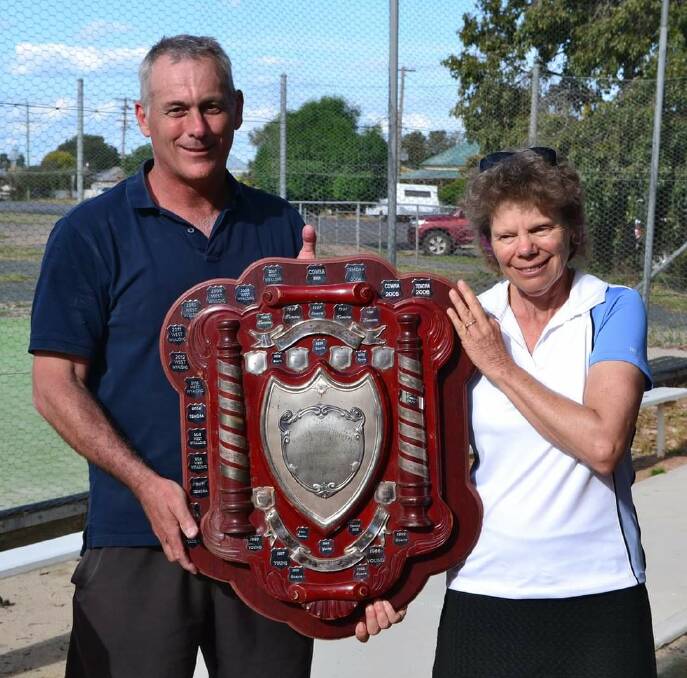 Inter Town Tennis Competition organiser Andrew Bartlet from West Wyalong presenting Forbes'Lindy Canon with the competition trophy. Photo supplied.