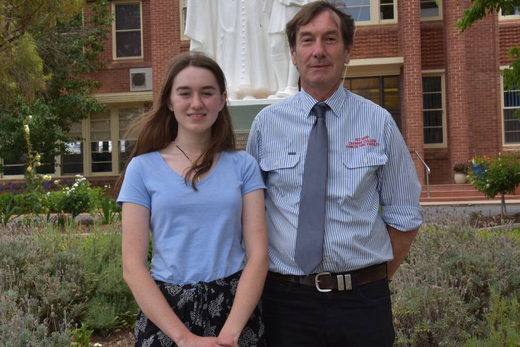 Emily Jeffery topped the state in the Primary Industry exam. Also pictured Red Bend Catholic College Agricultural Coordinator, Colin Hawthorn.