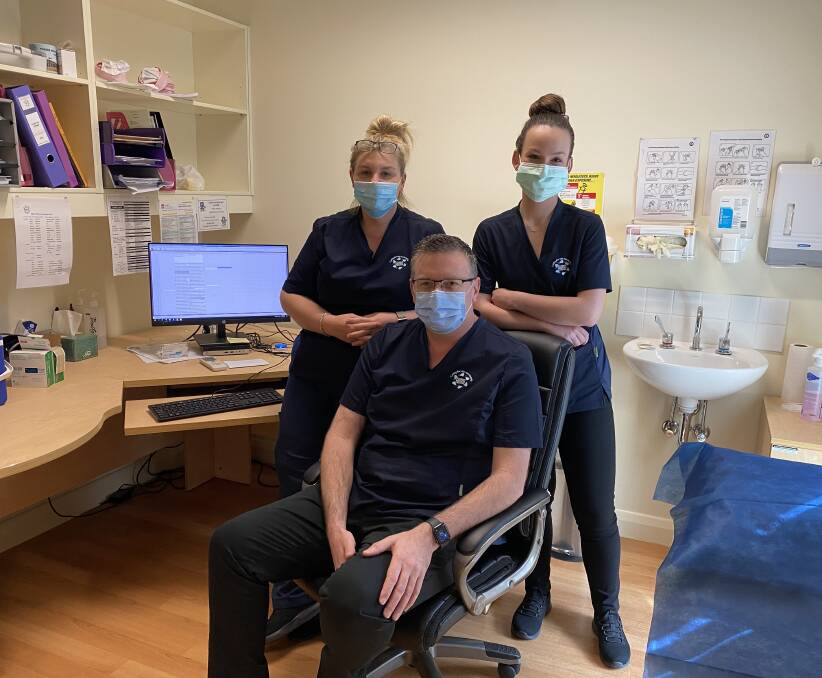 Registered Nurses Rebecca Cassidy (left) and Bronte Everingham (right) are rolling up their sleeves on a Saturday vaccination clinic with Practice Manager Darren Borger. Photo supplied.