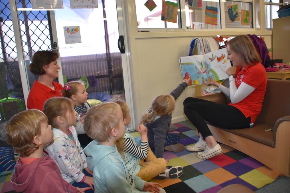 Students from the Learning Ladder got a head start with the reading activities. (Front) Hudson Welsh, Freya Dumbrell, Alice Davies. (Back) Declan Hurford, Primrose Walker, Layla Borge and Maree Yapp listen to Dell Welsh reading.