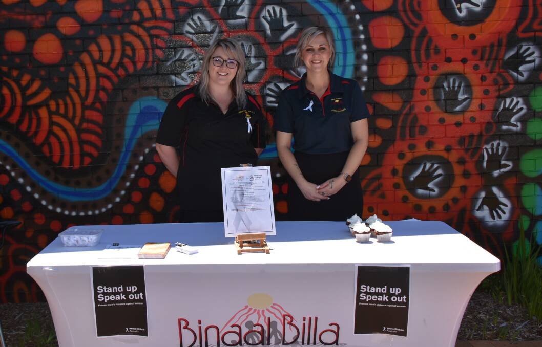 Stevie Darcy and Jade Acheson set up a stall outside of Yoorana Gunya to raise awareness for White Ribbon Day.
