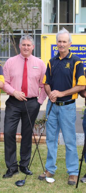 Forbes High Deputy Principal Jason Nottingham and Rotarian Ross Williams highlighting the charity golf day.