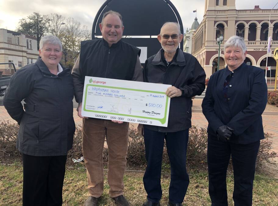 NSW Small Winemakers Wine Show donated $500 to Havannah House for their Christmas Day lunch. Pictured Jenny Watts, Mark Watts, David Virtue and Judy Kerr.