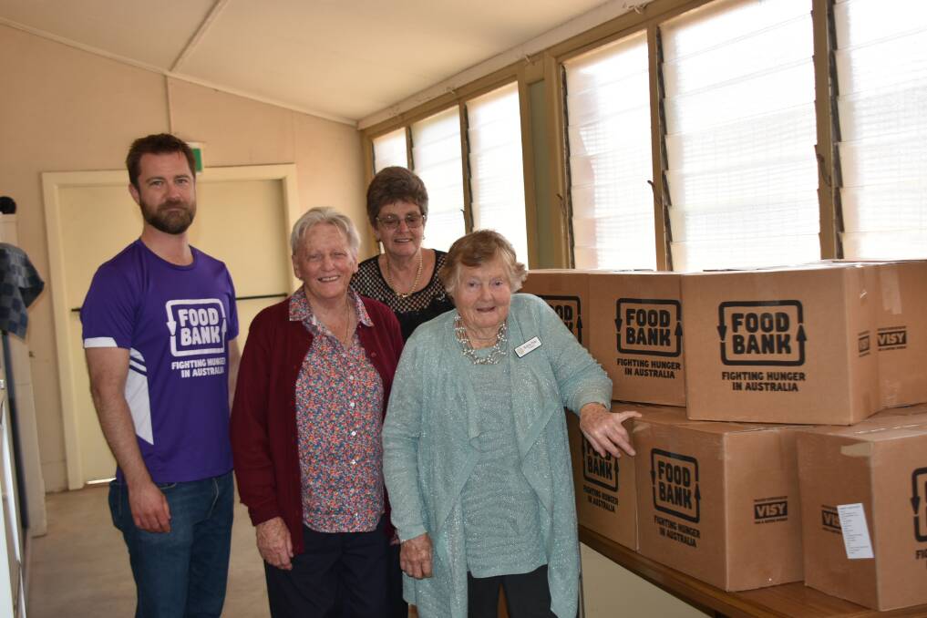 Foodbank's Adam Loftus with Anne Reade, Elaine Bright and Robin Pols.