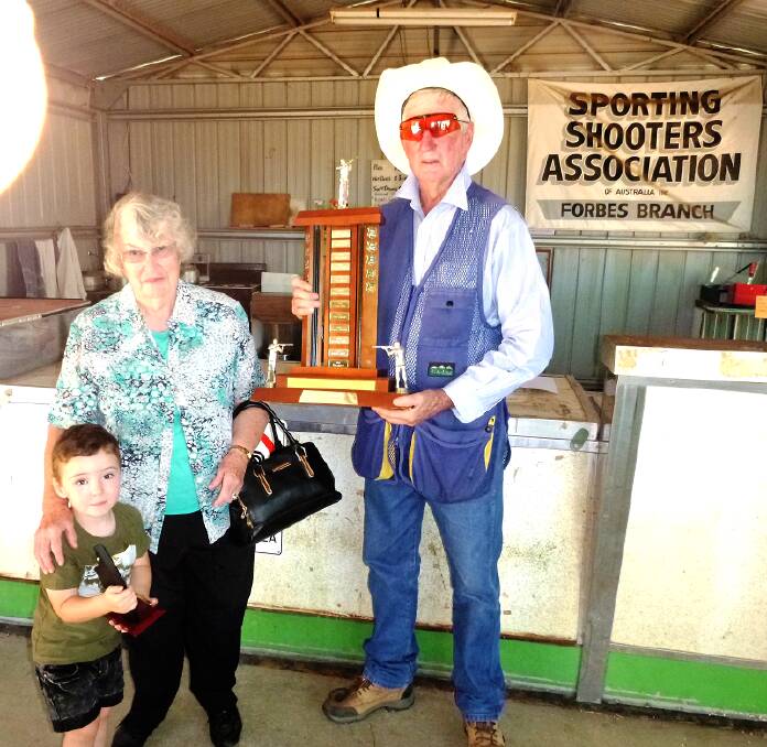 Mrs Jan Bradley with her grandson Cliff and Adrian Hodges, winner of the Cliff Bradley Memorial trophy.