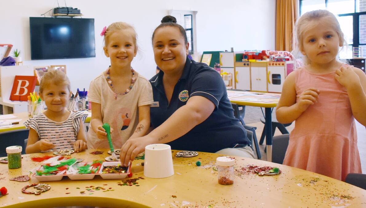 Ava Doyle, Amity Olsen, Tahlia Horvat and Milarni Holmes were getting their decorations ready to hang on the Preschool's Christmas tree.