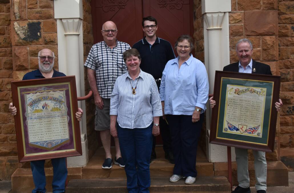 Neil Biddle, Trevor Currey, Jan Mullette, Patrick Moss, Deirdre Quirk and Michael Walker with two WW1 Honour Rolls. 